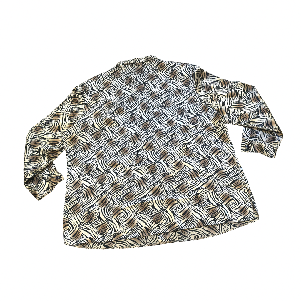 Blusa estampada animal print abstracto