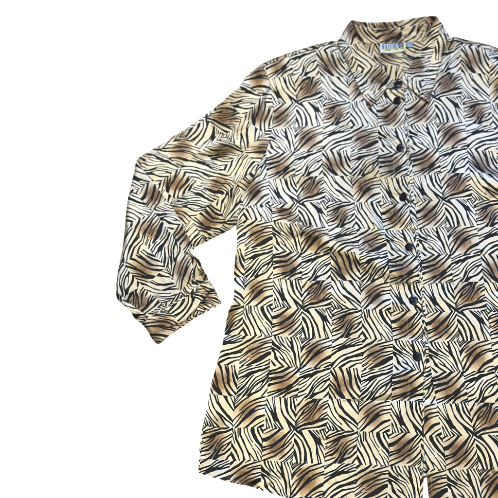 Blusa estampada animal print abstracto